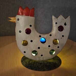 Lighted Jeweled Hen Candle Shines Through the Clear colored glass stones